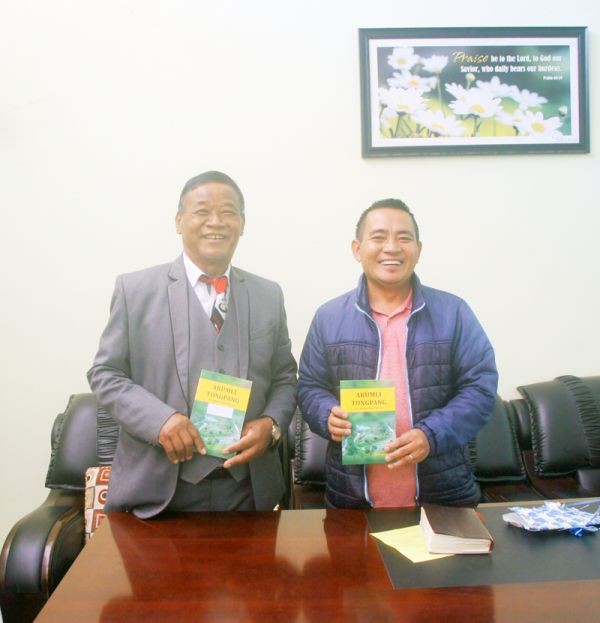 K Supong, Pastor, Longsa Baptist Church with Er C Kazukaba Jamir during the release of the book titled ‘Akumli Tongpang’ on December 6.